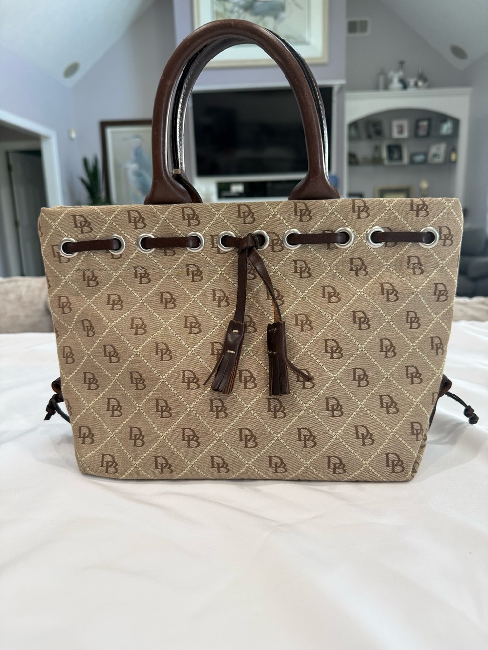 Dooney & Bourke Signature Tassel Beige and Brown Canvas Tote Brown Leather Strap